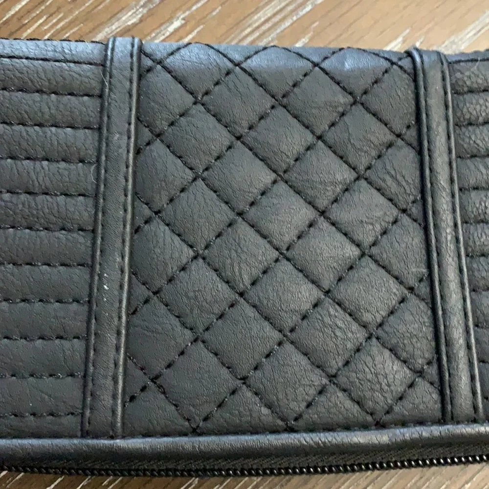 Unbranded black with black brads wristlets